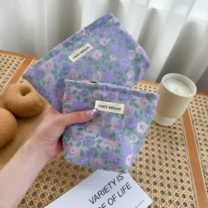 Set di pochette cosmetiche floreali viola con coulisse, borsa da trucco portatile da viaggio.