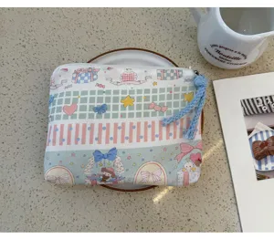 Cute cartoon canvas coin purse for women, portable cosmetic and lipstick storage pouch.