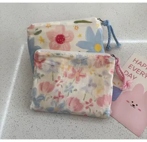 Floral print mini fabric storage pouch cute cosmetic coin purse zipper bag detail view