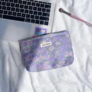 Borsa cosmetica tessuta a fiori viola, elegante trousse per trucco portatile da donna per viaggio.