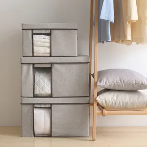 Large foldable fabric clothes storage box with clear window for home wardrobe and bedroom organization.