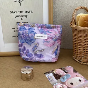 Borsa cosmetica vintage in jacquard viola chiaro con stampa floreale e chiusura lampo