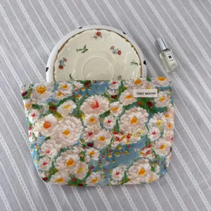 Large capacity oil painting cosmetic bag for women travel portable makeup storage pouch.