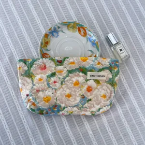 Large capacity oil painting floral makeup bag for travel, portable cosmetic pouch detail.