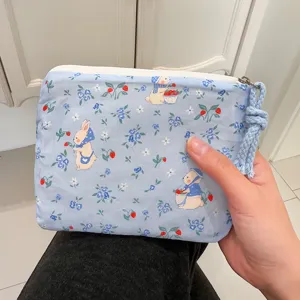 Cute blue rabbit coin purse portable makeup storage bag with sweet floral strawberry print.