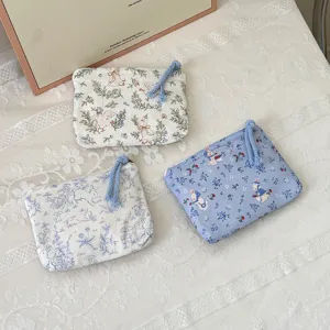 Cute pastoral rabbit fabric coin purse, portable large capacity makeup and travel storage bag.