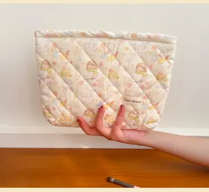 Cute cartoon quilted cosmetic bag, portable travel makeup storage pouch with lovely bear print.