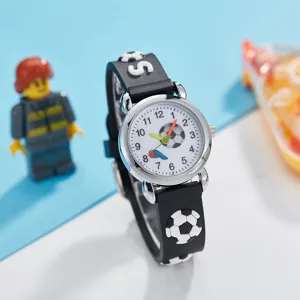 Children soccer quartz watch detail view, cute cartoon design with black silicone strap.