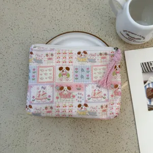 Cute cartoon canvas coin purse portable makeup pouch with zipper and pink tassel for daily use.
