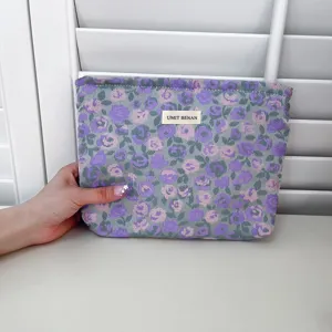 Borsa cosmetica floreale, mini trousse trucco, elegante organizer da viaggio chic per donne.