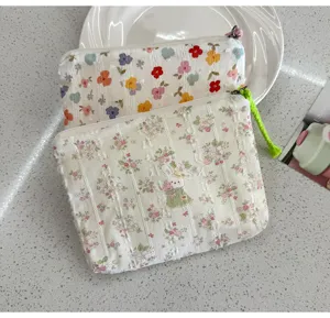 Floral makeup bag with zipper, cute rabbit pattern portable storage pouch for cosmetics.