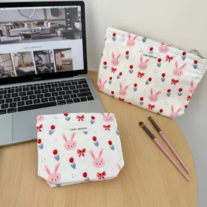 Canvas cartoon rabbit cosmetic bag set, large capacity portable travel makeup storage pouch.
