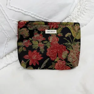 Vintage dark red floral jacquard cosmetic bag for women, stylish travel zipper pouch.
