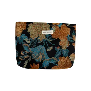 Vintage dark floral jacquard cosmetic bag main view, elegant travel makeup pouch for women.