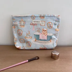 Large capacity cosmetic bag featuring a cute cat bathing print, perfect for travel storage.