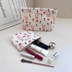 Cartoon rabbit floral canvas makeup bag, cute travel portable cosmetic storage pouch for women.