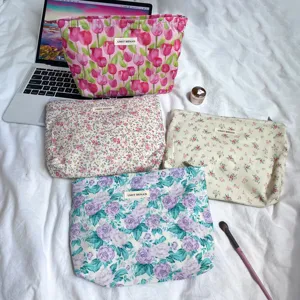 Floral cotton cosmetic bag set with zip closure, featuring various cute flower prints for daily use.