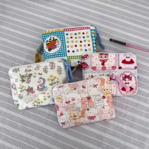 Cute cartoon fabric cosmetic bag portable zipper pouch for lipstick sanitary napkin daily items.