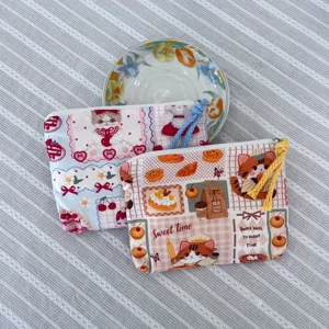Cute cat pattern canvas zipper pouch, detailed view of cosmetic and coin storage bag with charm.