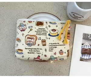Grazioso portamonete in tela con gatto, trousse per trucco portatile e pratico astuccio da viaggio.