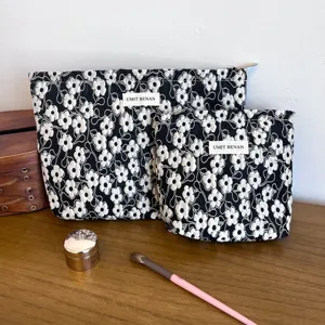 Black 3D floral makeup bag set, large capacity cosmetic organizer, portable travel pouch.
