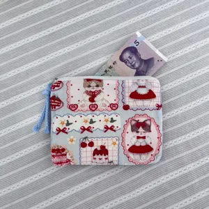 Cute cartoon cat print canvas coin purse detail, portable mini zipper pouch for small items.