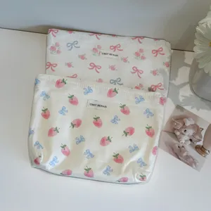 Cute bow strawberry print portable cosmetic bag, large capacity canvas makeup storage pouch.