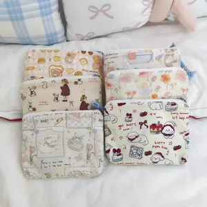 Cute cartoon canvas pouch detail, featuring adorable bear and dog prints with secure zipper.