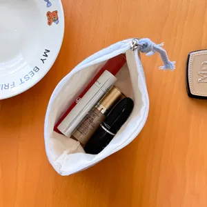 Portable canvas cosmetic bag, cute travel makeup pouch, small zipper storage bag for women.