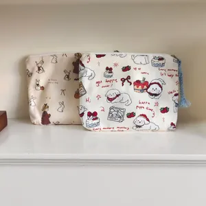 Cute canvas cosmetic pouch and coin purse with adorable cartoon dog and dessert print design.