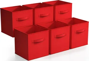 Detailed view of red foldable fabric storage boxes, open top square bins with handles for home closet.