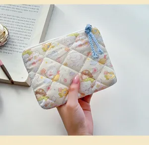 Cute quilted cartoon puppy cosmetic bag, portable travel makeup storage pouch for women.