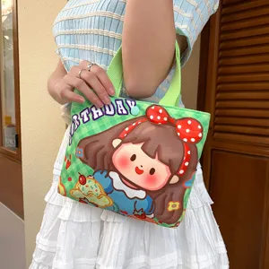 Cute canvas handbag featuring a sweet cartoon girl graphic, compact and stylish tote bag for daily use.