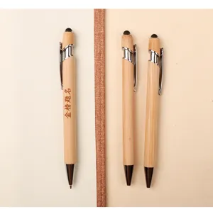 Bamboo ballpoint pen with stylus tip, eco-friendly wooden gift pen for office and school.