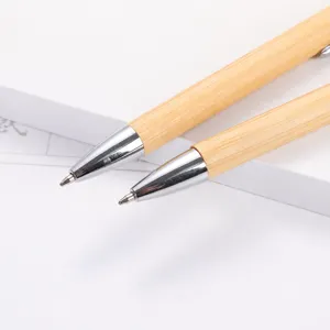 Natural bamboo ballpoint pen with metallic tip, eco-friendly promotional writing gift pen.