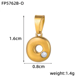 Detail view of a gold-plated stainless steel letter pendant with sparkling diamond accent.