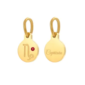 Gold stainless steel Capricorn zodiac pendant charm with red zircon for jewelry making.