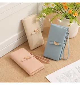 Women's long wallet with leaf buckle, PU leather multi-card holder clutch purse with wrist strap.
