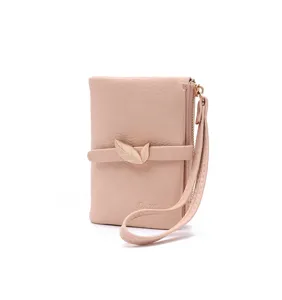 Pink short women's wallet detail showing the elegant metal leaf clasp and convenient wrist strap.