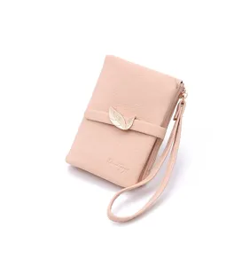Women short wallet pink PU leather purse with metal leaf decor and wrist strap daily use.