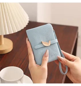 Light blue short wallet with leaf buckle and wrist strap, premium daily card holder for women.