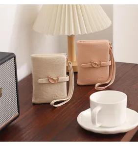 Minimalist leaf short women wallet with buckle wrist strap, chic daily folding purse.