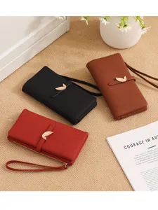 Women's long wallet with wrist strap and gold leaf clasp, stylish PU leather purse.