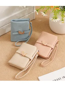 Short women wallet with wrist strap and leaf clasp, stylish PU leather card holder coin purse.