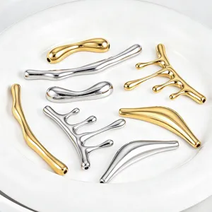 Detailed close-up of various stainless steel lava shaped jewelry pendant accessories.