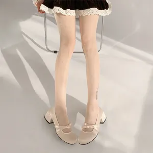 Summer ultra-thin shiny sequin pantyhose for women, nude glitter tights showing slim legs.