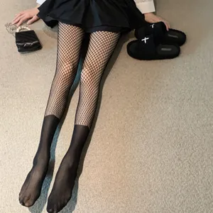 Medias de red sexis falsas hasta el muslo medias negras de mujer verano elegante.