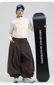 Professional wide leg loose snowboard pants for women and men, waterproof winter sports gear.