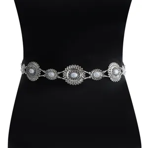 Close-up of the vintage silver flower waist chain, gothic alloy body chain detail.
