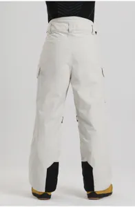 Winter ski pants detail view, thick windproof waterproof cargo snow pants for outdoor sports.